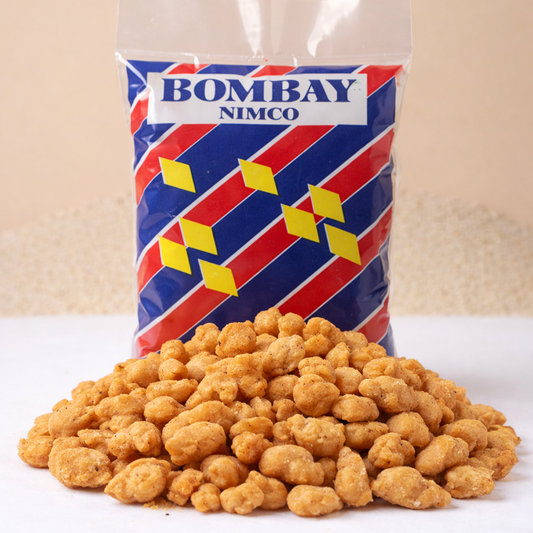 Bag of Bombay Nimco snacks on a white surface with a beige background