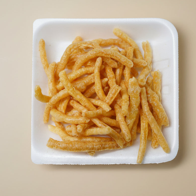 PLAIN KURKURAY in a white container , BOMBAY NIMCO