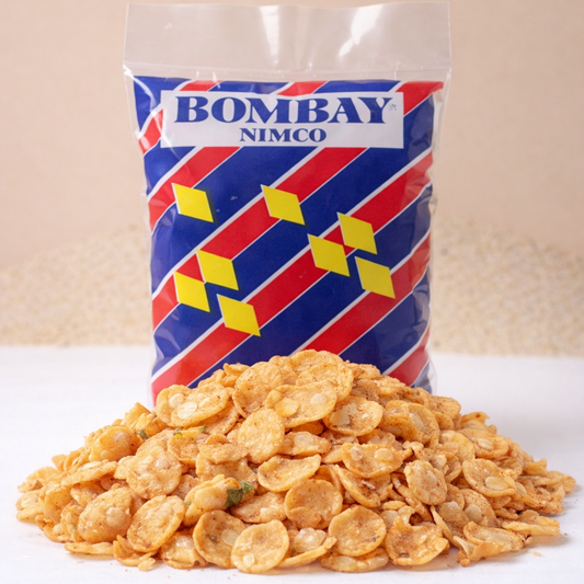 Bag of Bombay Nimco snacks on a white surface with a beige background